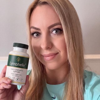 Margaret Ellison holding a bottle of Lymphelle+